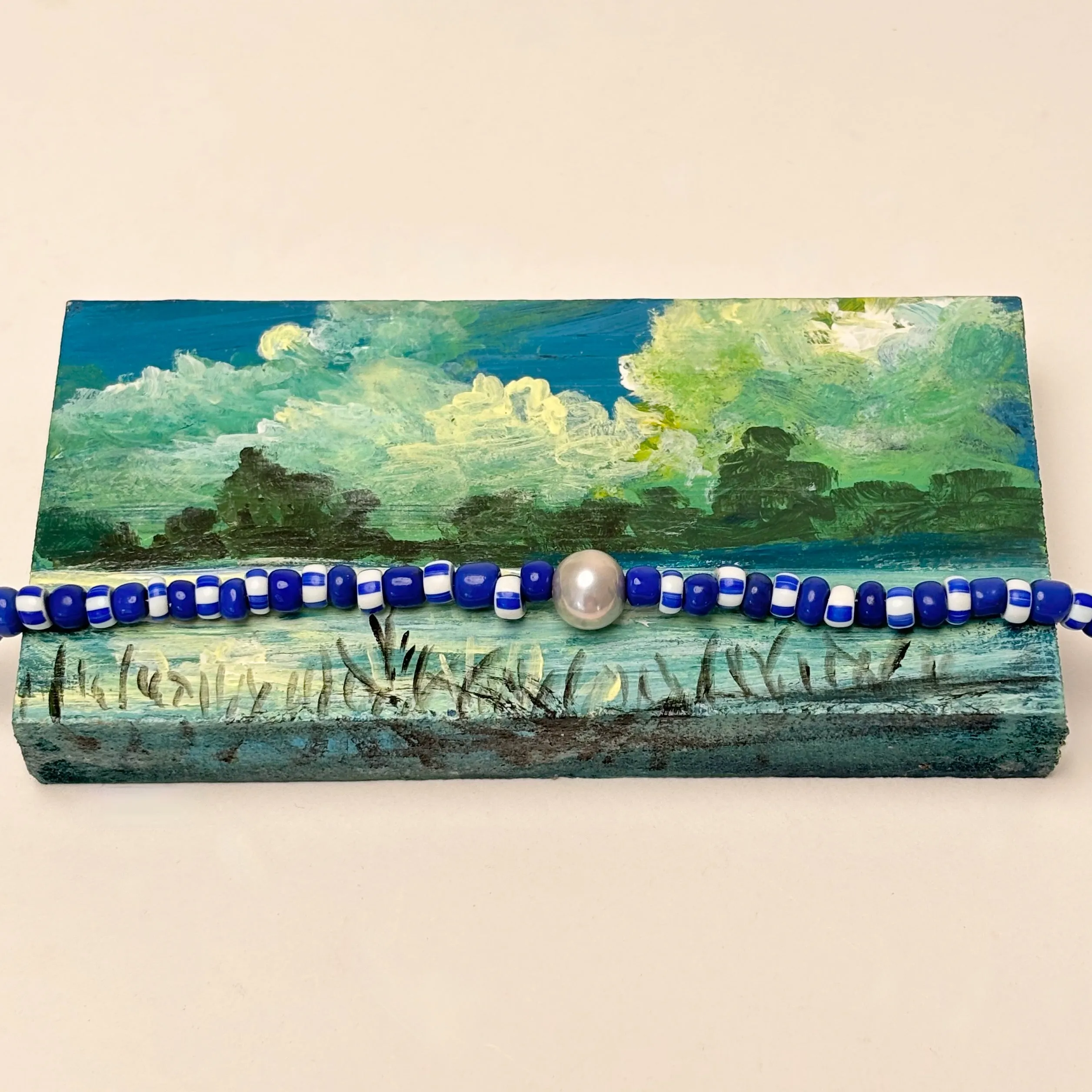 blue solid blue stripe silver pearl bracelet